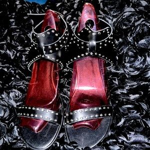 Black, all leather studded sandals with block heel.